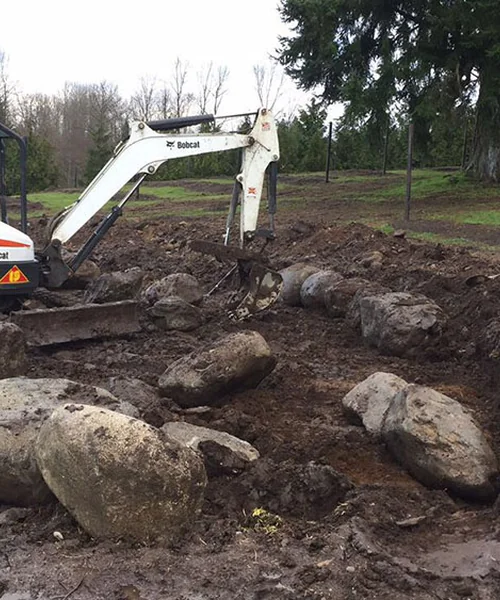 Rock Wall, Irrigation System & New lawn in Bonney Lake 
